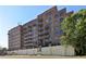Brick building exterior with multiple balconies at 3235 Roswell Ne Rd # 716, Atlanta, GA 30305
