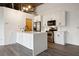 Modern kitchen with white shaker cabinets, stainless steel appliances, and quartz countertops at 3235 Roswell Ne Rd # 716, Atlanta, GA 30305