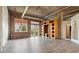 Spacious living area with exposed brick and high ceilings at 3235 Roswell Ne Rd # 716, Atlanta, GA 30305