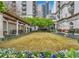 Landscaped courtyard with pergola and ample seating areas at 199 14Th Ne St # 1209, Atlanta, GA 30309