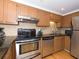 Modern kitchen with granite countertops and stainless steel appliances at 199 14Th Ne St # 1209, Atlanta, GA 30309