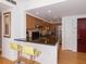 Modern kitchen with granite countertops, stainless steel appliances, and light wood cabinets at 199 14Th Ne St # 1209, Atlanta, GA 30309
