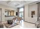 Elegant lobby lounge with seating, fireplace, and large windows at 199 14Th Ne St # 1209, Atlanta, GA 30309