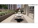 Cozy outdoor patio with seating for residents at 199 14Th Ne St # 1209, Atlanta, GA 30309