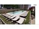 Modern pool with surrounding lounge chairs at 199 14Th Ne St # 1209, Atlanta, GA 30309