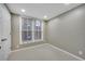 Finished basement bedroom with neutral walls and carpet at 3053 Hudson Way, Decatur, GA 30033