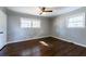 Spacious bedroom with dark hardwood floors and neutral walls at 3377 Bobolink Cir, Atlanta, GA 30311