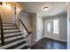 Inviting entryway with hardwood floors and staircase at 3377 Bobolink Cir, Atlanta, GA 30311