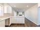 Modern kitchen with white cabinets and quartz countertops at 3377 Bobolink Cir, Atlanta, GA 30311