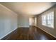 Open living room with hardwood floors and view of entry at 3377 Bobolink Cir, Atlanta, GA 30311