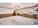 Living room with carpeted flooring and ceiling fan at 1618 Williams Lake Rd, Hiram, GA 30141