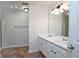 Bright bathroom with double vanity, tile flooring, and separate shower area at 5665 Terremont Cir, Norcross, GA 30093
