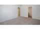 Bedroom with ensuite bathroom, beige carpet and fresh paint at 5665 Terremont Cir, Norcross, GA 30093