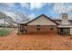Brick home with screened porch and small backyard at 5863 Wintergreen Rd, Norcross, GA 30093
