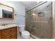Updated bathroom with a large walk-in shower and modern fixtures at 5863 Wintergreen Rd, Norcross, GA 30093