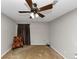 Relaxing bedroom with ceiling fan, neutral walls, and ample space for furniture at 5863 Wintergreen Rd, Norcross, GA 30093