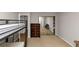 Bunk beds and mirrored closet in a well-lit bedroom at 5863 Wintergreen Rd, Norcross, GA 30093