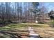 Large backyard with shed, trampoline, and playset at 3740 Garnet Way, Snellville, GA 30039