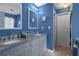 Double vanity bathroom with granite countertops at 3740 Garnet Way, Snellville, GA 30039