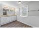 Elegant bathroom with double vanity and decorative window at 4642 Mahonia Nw Way, Acworth, GA 30102