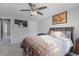 Large bedroom with king-size bed and access to another room at 3367 Lineview Dr, Ellenwood, GA 30294