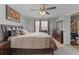 Spacious Primary bedroom with king-size bed and ensuite access at 3367 Lineview Dr, Ellenwood, GA 30294