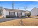 House exterior featuring a well-maintained lawn at 3367 Lineview Dr, Ellenwood, GA 30294