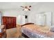 Main bedroom showcasing a ceiling fan, spacious layout, and multiple closets at 661 Towering Pine Se Trl, Lawrenceville, GA 30045