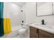 Modern bathroom with soaking tub, shower, and stylish vanity at 130 Wesley Place, Fayetteville, GA 30214