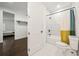 Clean bathroom with white subway tile and a bathtub at 130 Wesley Pl, Fayetteville, GA 30214