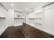 Large walk-in closet with ample shelving and hanging space at 130 Wesley Place, Fayetteville, GA 30214