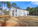 Modern farmhouse with attached garage and spacious yard at 130 Wesley Pl, Fayetteville, GA 30214