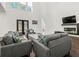 Bright living room featuring hardwood floors and fireplace at 130 Wesley Place, Fayetteville, GA 30214