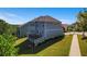 Back of the house featuring a deck and partial view of the backyard at 1553 Brunswick St, Lithia Springs, GA 30122