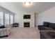 Bright and airy living room with a fireplace and comfortable seating at 1553 Brunswick St, Lithia Springs, GA 30122