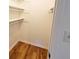 Well-organized closet with wood-look floors and shelving at 300 E Campbellton E St, Fairburn, GA 30213