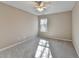 Bedroom with gray walls, gray carpet, and a window at 355 Holland Springs Way, Powder Springs, GA 30127