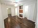 Finished basement bedroom with multiple closets and dark brown vinyl plank flooring at 355 Holland Springs Way, Powder Springs, GA 30127