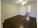 Spacious bedroom with dark brown vinyl plank flooring and large closet at 355 Holland Springs Way, Powder Springs, GA 30127