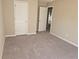 Simple bedroom with carpet flooring and ceiling fan at 355 Holland Springs Way, Powder Springs, GA 30127