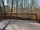 Spacious deck overlooking wooded area, perfect for outdoor relaxation at 355 Holland Springs Way, Powder Springs, GA 30127