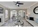 Bright living room featuring modern decor, fireplace, and views of the open-concept kitchen at 355 Holland Springs Way, Powder Springs, GA 30127