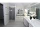 Luxurious bathroom with a large soaking tub and walk in shower at 355 Holland Springs Way, Powder Springs, GA 30127