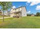 A charming two-story home boasts lush green lawn and beautifully landscaped front yard at 8819 Sibella Ct, Lithia Springs, GA 30122