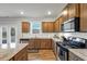 Kitchen with stainless steel appliances and granite countertops at 8819 Sibella Ct, Lithia Springs, GA 30122