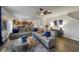Open-concept living room seamlessly connects to the modern kitchen at 8819 Sibella Ct, Lithia Springs, GA 30122