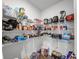 Walk-in pantry featuring wire shelving and ample storage for groceries and kitchen essentials at 8819 Sibella Ct, Lithia Springs, GA 30122