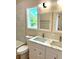 Modern bathroom with double vanity, quartz countertop, and large tiled shower at 2125 Clay Rd, Austell, GA 30106