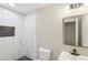 Modern bathroom featuring white marble tile and black herringbone pattern accents at 50 Silver Tip Ct, Mcdonough, GA 30253