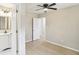 Bedroom boasts natural light, new floors and an adjoining bathroom at 50 Silver Tip Ct, Mcdonough, GA 30253